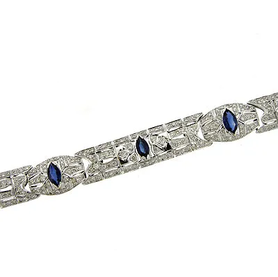 14KW Round Diamonds and Marquise Blue Sapphire Bracelet